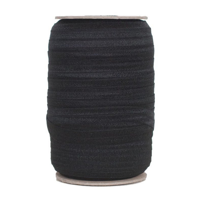 May include: A spool of black elastic trim, wound on a cardboard core.