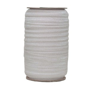 May include: A roll of white elastic trim with a slight sheen. The trim is wound around a cardboard core.