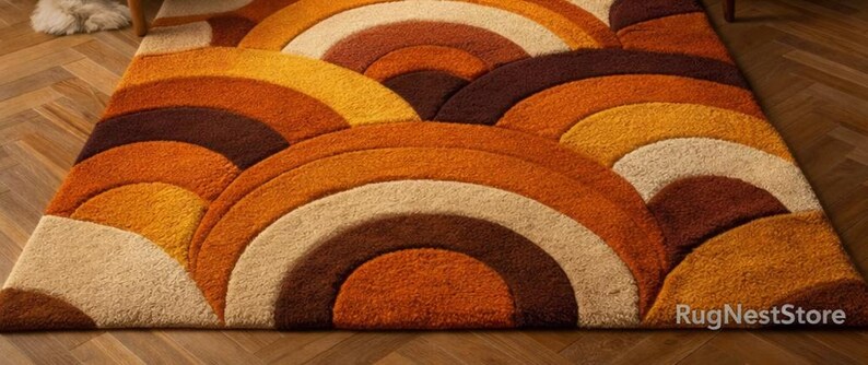 Handmade retro rainbow arch tufted area rug featuring geometric mid century modern design in burnt orange, mustard yellow, cream, and brown tones for boho living room decor.