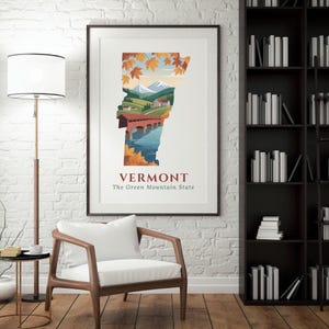 May include: Framed art print featuring a stylized illustration of Vermont's landscape within the state's outline. The artwork showcases a bridge, mountains, and autumn foliage, with the text "VERMONT" and "The Green Mountain State".