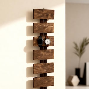 Puede incluir: Un juego de tres tazas de cerámica con un acabado moteado y mate. Las tazas son de color crema, gris claro y gris oscuro. Cada taza tiene un diseño simple y minimalista, perfecto para café o té.