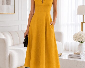 May include: A sleeveless mustard yellow midi dress featuring a notched lapel collar, a V-neckline, a fitted bodice, and a flared skirt with side pockets. The dress is made of a solid-colored fabric and falls below the knees in a structured silhouette.
