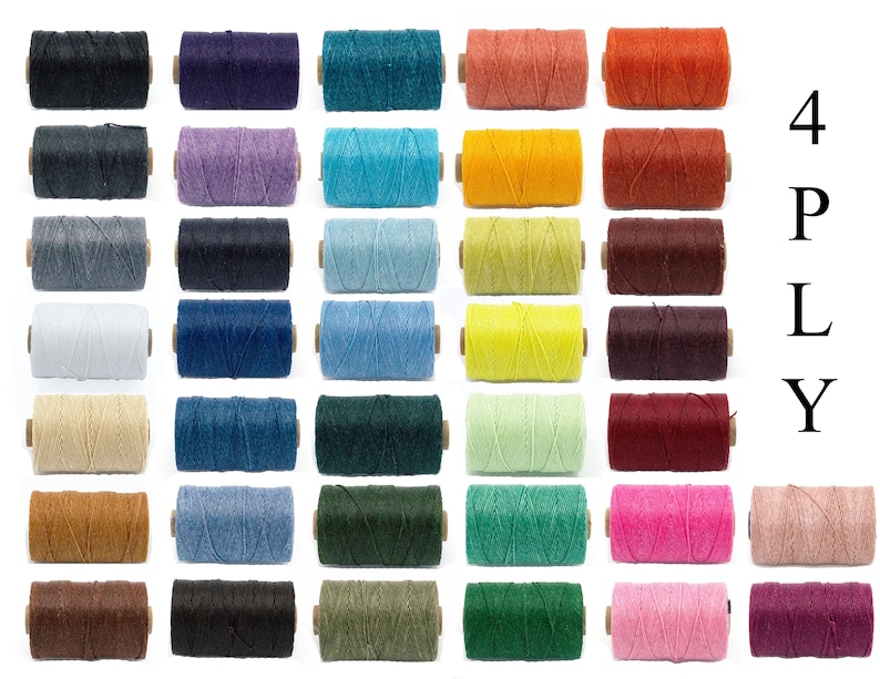 May include: A collection of 24 spools of 4-ply twine in various colors, including black, purple, teal, orange, gray, lavender, turquoise, yellow, brown, navy, blue, light blue, lime green, dark red, beige, denim, forest green, sea green, pink, and light pink.
