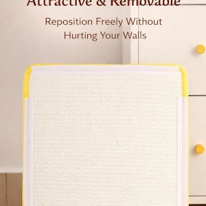 May include: A close-up of a cream-colored, textured adhesive pad with yellow trim and white borders. Text on the image reads "No-Damage Adhesive Attractive & Removable. Reposition Freely Without Hurting Your Walls."