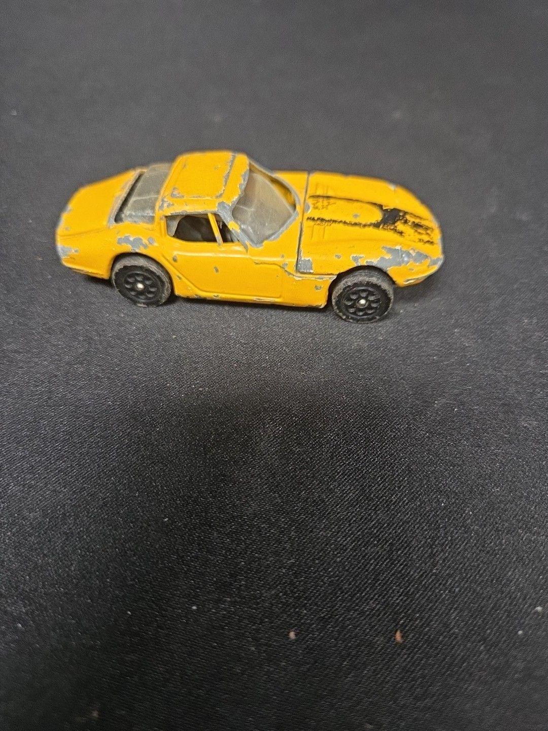 Corgi Toys 377 Yellow Marcos 3 Litre Whizzwheels Diecast Vehicle