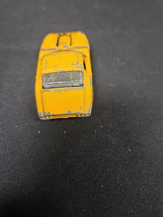 Corgi Toys 377 Yellow Marcos 3 Litre Whizzwheels Diecast Vehicle