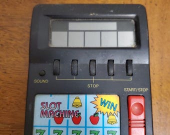 Minimáquina tragamonedas Radio Shack con pantalla LCD, de mano y a pilas, de estilo vintage, probada