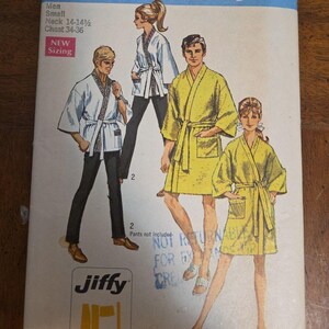 May include: Vintage Simplicity pattern 8256 featuring illustrations of people wearing robes. The pattern includes sizing information for men, with neck sizes 14-14.5 inches and chest sizes 34-36 inches. The Jiffy pattern includes 4 main pattern pieces.