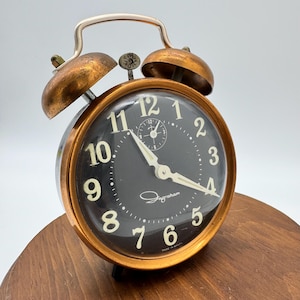 Vintage Working 1960s Ingraham Black and Copper Mechanical Wind Up Alarm Clock
