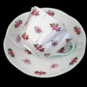Vintage Shelley “Rosebud” Dainty Shape Teacup & Saucer, Baby Blue Handle and Trim, Fine Bone China, England, ca. 1940s–60s