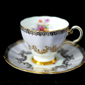 Grosvenor China Tea Cup and Saucer – Black & Gold Filigree with Floral Center, Vintage English Bone China, 1950s