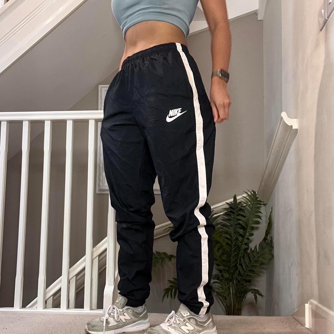 nike stripe tracksuit bottoms