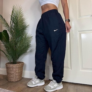 navy nike tracksuit bottoms womens