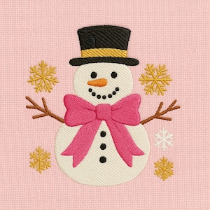May include: Embroidered snowman design with a black top hat, orange carrot nose, and a pink bow tie. The snowman has twig arms and is surrounded by gold and white snowflakes on a pink background. A festive winter holiday theme.