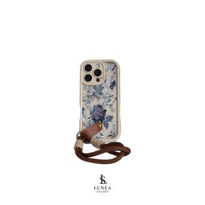 Custodia per iPhone bianca con motivo floreale e passante in pelle – Custodia floreale vintage con passante antiscivolo