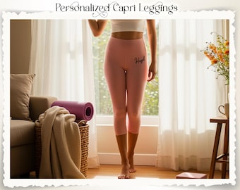 May include: Pink capri leggings with the name "Hazel" printed on the left leg. The leggings are high-waisted and worn by a person standing in front of a window. The text "Personalized Capri Leggings" is at the top of the image.