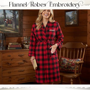May include: A red and black buffalo plaid flannel robe with the embroidered name "Sarah". The robe is tied at the waist with a matching belt. The image also includes the text "Flannel Robes Embroidery".