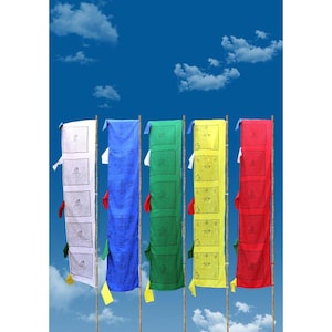 May include: Five vibrant prayer flags in front of a clear blue sky with white clouds. The flags are in white, blue, green, yellow, and red. Each flag is rectangular and features a series of smaller rectangular images.