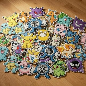 May include: A collection of colorful embroidered patches featuring various Pokémon characters. The patches showcase a variety of designs, including Pikachu, Squirtle, Charmander, and others, with vibrant colors and detailed stitching. These patches are likely for clothing or accessories.