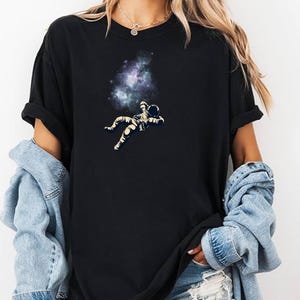 Astronaut Galaxy T-Shirt: Cosmic Streetwear for Space Lovers