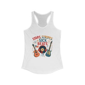 May include: White vest top with a graphic design featuring a guitar, bass, and a record. The design includes the text "STARS, STRIPES & SICK BEATS" in red, white, and blue. The vest top has a racerback style.
