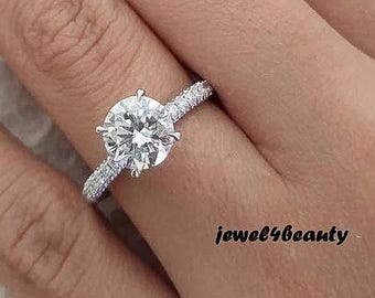 Round Moissanite Engagement Ring: 14k Yellow Gold, 4-Prong Setting