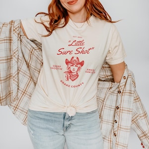 Vintage Annie Oakley Graphic Tee: Komfortfarben Cowgirl-Shirt