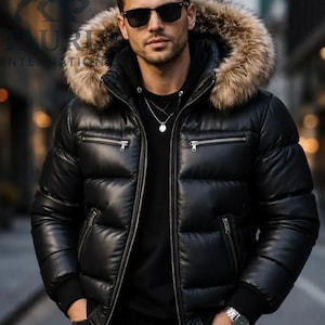 May include: A black puffer jacket with a fur-lined hood. The jacket has a shiny, quilted appearance with multiple zippered pockets. The person in the image is wearing sunglasses and a silver necklace.