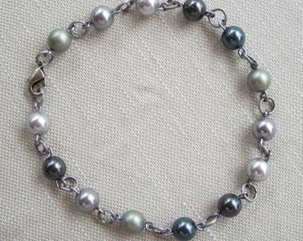 bracelet . . . pearls . . . heart . . . no. 713