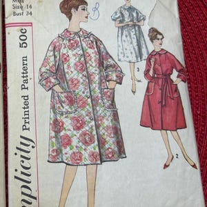 1950’s Simplicity Sewing Pattern 3216 Misses Peter Pan Collar Button Front Knee Length Robe Size 14 Cut- 1950’s misses robe