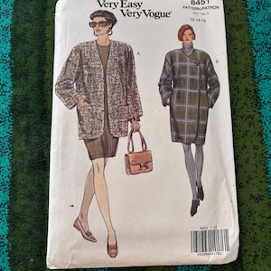 May include: A vintage Very Easy Very Vogue sewing pattern, number 8451, featuring illustrations of two women's fashion designs. The pattern includes sizes 12-14-16. The cover has a white background with a barcode and text.