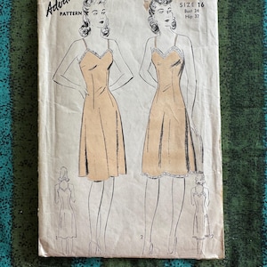 May include: Vintage Advance Pattern 3004, size 16, featuring a slip dress design. The illustration shows a woman in a slip dress with spaghetti straps and lace trim. The pattern is printed on aged paper with the price 15¢.