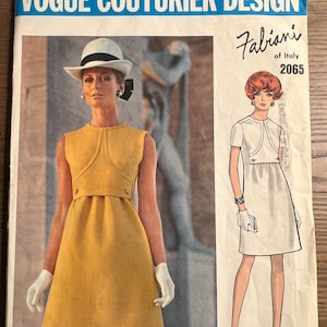 May include: A vintage Vogue Couturier Design sewing pattern featuring a yellow dress and a white dress design. The pattern includes the text "Fabiani of Italy 2065" and "Fabiani Original Photographed in Rome."