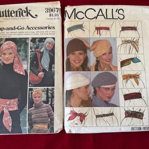 May include: Two vintage sewing patterns for women's accessories. The Butterick pattern is for a wrap-and-go accessory, and the McCall's pattern is for a beret and a sash. Both patterns feature illustrations of women wearing the accessories.