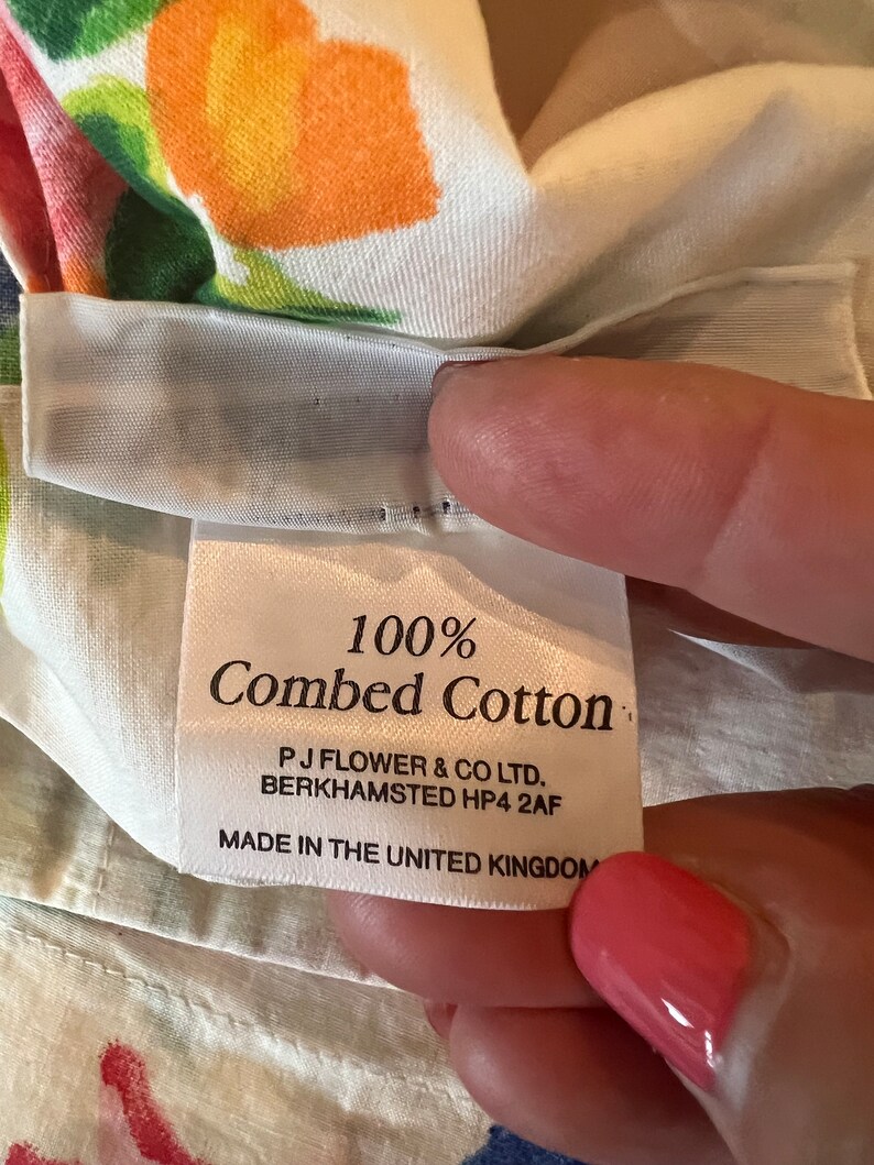 May include: White fabric label with the text "100% Combed Cotton" and the company information "PJ Flower & Co Ltd. Berkhamsted HP4 2AF Made in the United Kingdom."