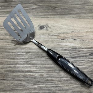 Vintage RARE Foley Short Angled Offset Slotted Spatula with Black Plastic Handle Chrome Plated 10”- Foley short slotted spatula, spatula