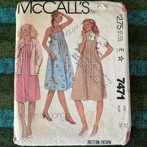 May include: Vintage McCall's sewing pattern featuring illustrations of women's dresses. The pattern cover includes the text "McCall's", the price, and the pattern number 7471. The illustrations depict various dress styles, including a floral print dress.