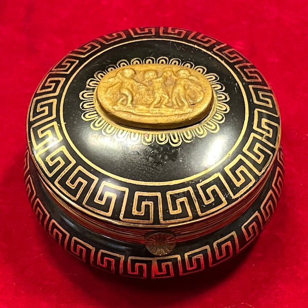 Vintage Arnart Royal Vienna Black and Gold Roman Covered Box Dish with Greek Key Design and Gold Cherubs on lid 4”- Hollywood Regency box