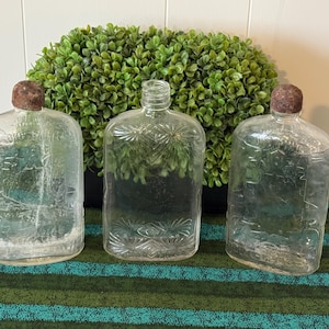 RARE Lot of 3 Antique Whiskey Bottles ~Two LYONS Since 1852 1 Pint Glass Whiskey Bottle w/ Rusted Lid & One Spider Weg Sunburst Pattern