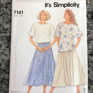 May include: Simplicity sewing pattern 7141, featuring two women modeling a top and skirt ensemble. The pattern cover includes the text "It's SO EASY" and "it's Simplicity". Size range is 8-20.