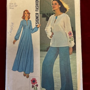 May include: Simplicity sewing pattern number 0927, Designer Fashion, size 12, bust 34 inches, for misses. The pattern includes instructions for making a long, flowing dress with a gathered neckline and a pair of wide-legged pants with a gathered neckline. The pattern includes a transfer for embroidery.