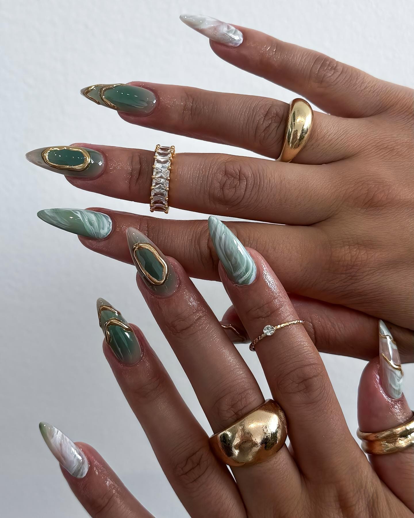 Elegant Gold Marble Nails That Shine