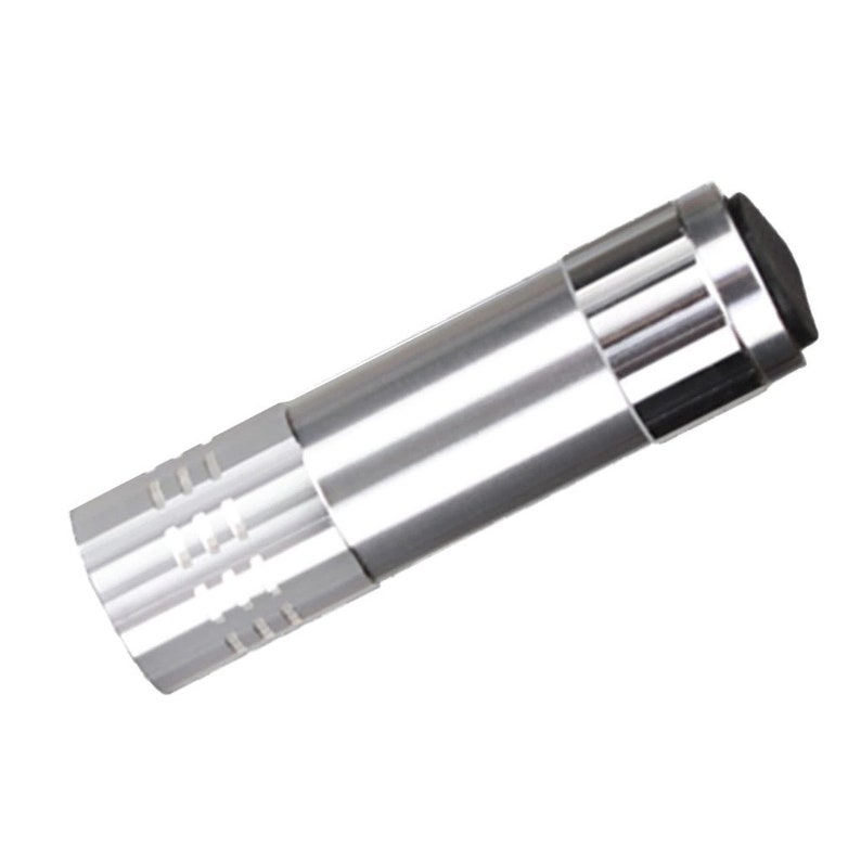 May include: A silver flashlight with a black end cap. The flashlight has a textured grip and a smooth body.