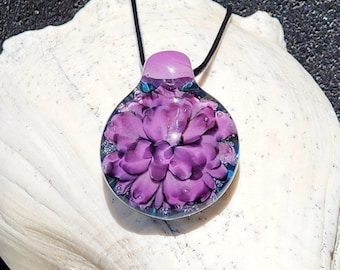 Handmade Borosilicate Glass Pendant Necklace: Purple and Black on a Blue Background