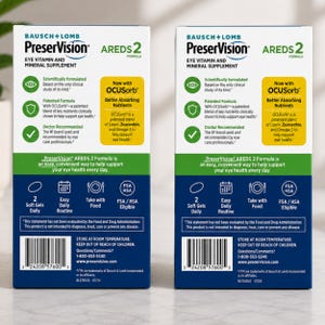 May include: Two boxes of PreserVision AREDS 2 Formula eye vitamin and mineral supplement. The boxes are white with blue and green accents, featuring product information and the brand logo. Each box contains 2 soft gels for daily use.