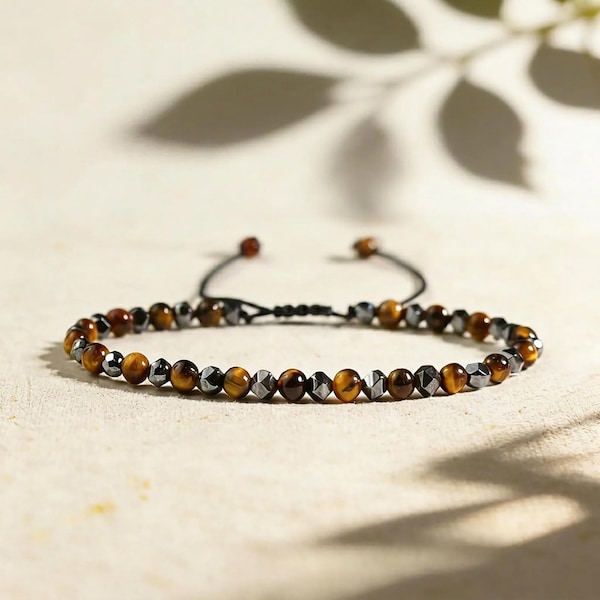 Pulsera de obsidiana y hematita con ojo de tigre: piedra de triple protección para la conexión a tierra, la confianza y la seguridad emocional.