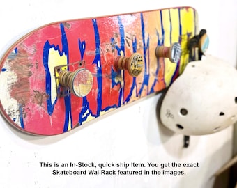 Recycled Skateboard Coat Rack: Wall Mounted with Peg Hooks. Red and Yellow Creature Skateboard