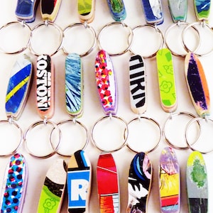 Little Skateboard Keychain or Bag Zipper Charm made from Recycled Skateboards by Deckstool.
