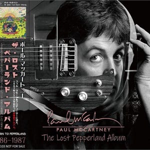 May include: Black and white album cover featuring Paul McCartney with a guitar overlay. The album title, "The Lost Pepperland Album," and McCartney's signature are visible. The cover also includes text in Japanese and English, with the text "Return to Pepperland 1986-1987."