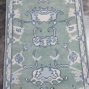 Hand-Knotted Olive Green Oushak Rug: Turkish Wool Carpet